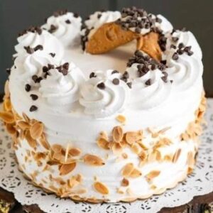Cannoli cake with Italian cannoli cream whipped cream mini cannolis and toasted almonds Sugar Dreams Bakery East Patchogue