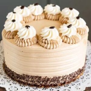 Mocha chocolate cake with coffee buttercream peanut butter cups and chocolate ganache drip Sugar Dreams Bakery East Patchogue