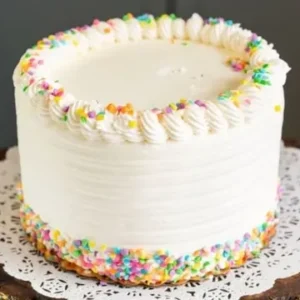 Funfetti vanilla birthday cake with white buttercream and rainbow sprinkles Sugar Dreams Bakery East Patchogue