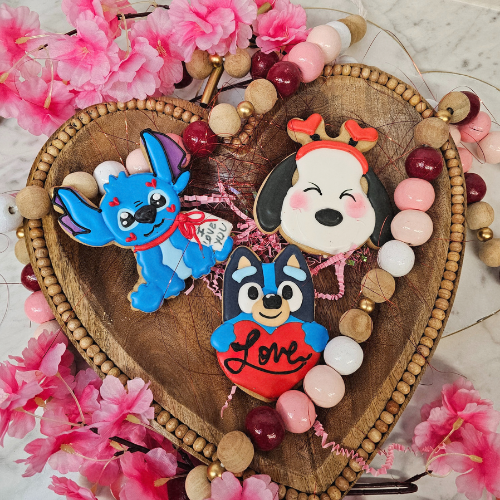 Valentine's Day chocolate heart box with Disney Stitch characters and macarons Sugar Dreams Bakery